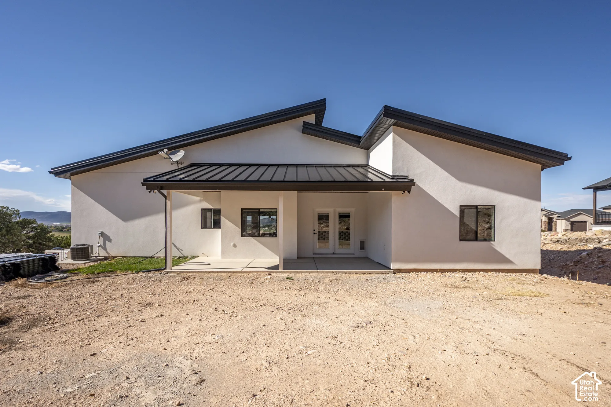Contemporary exterior design with white stucco finish