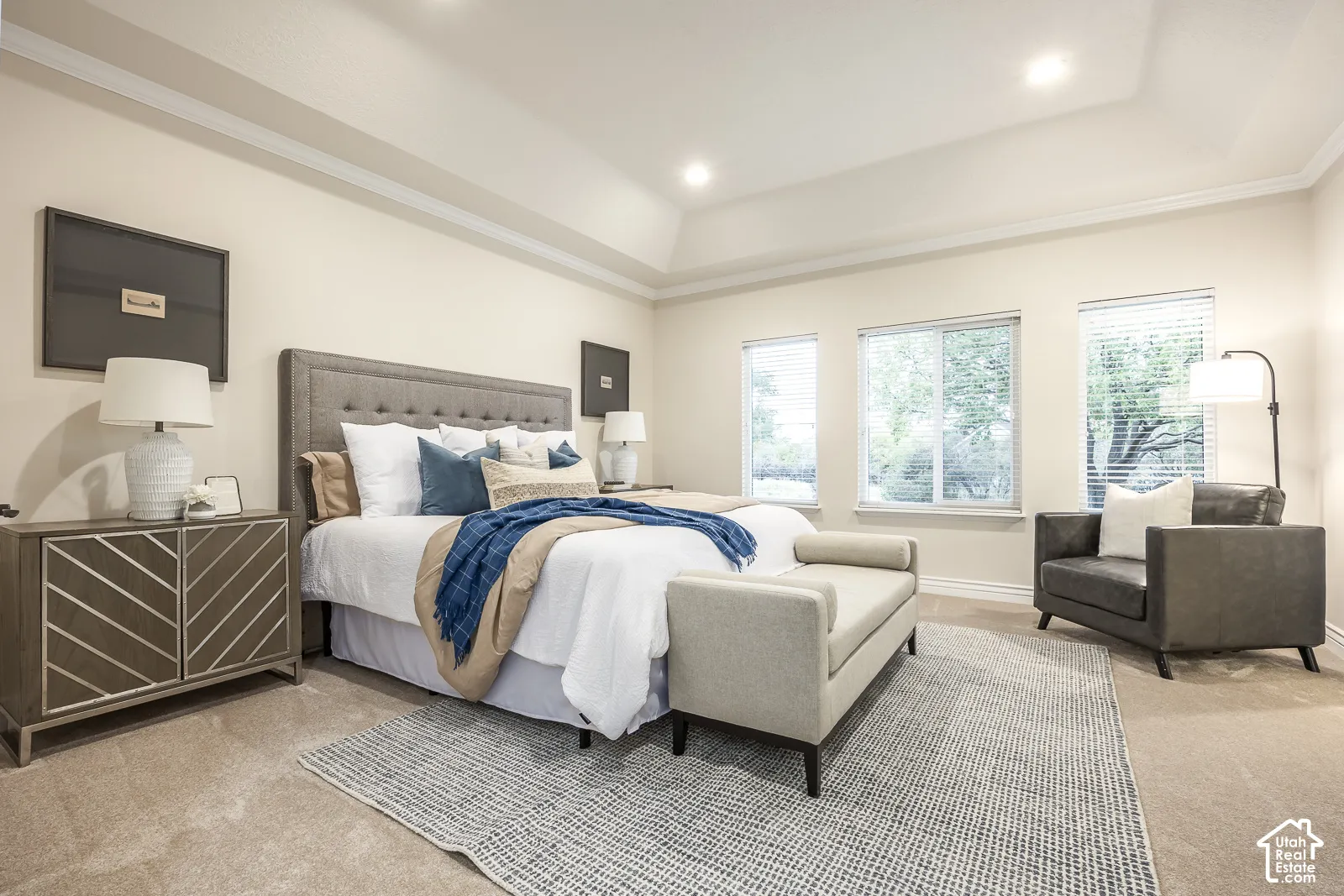 Tray ceiling with recessed lighting and crown molding