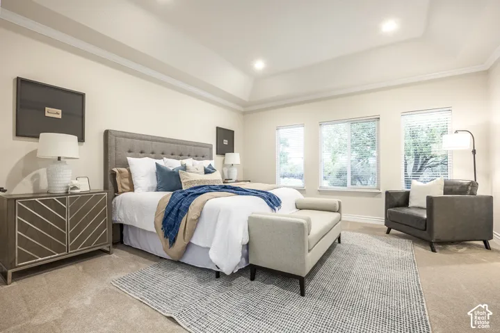 Tray ceiling with recessed lighting and crown molding