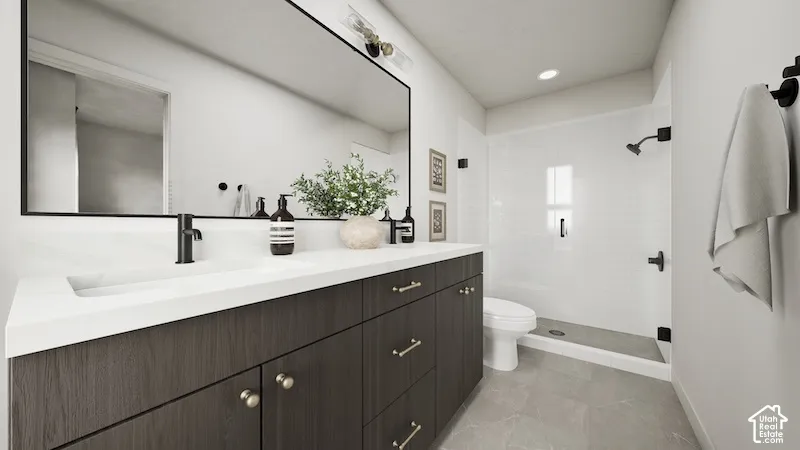 Double vanity with an integrated white sink and dark wood-finish cabinetry