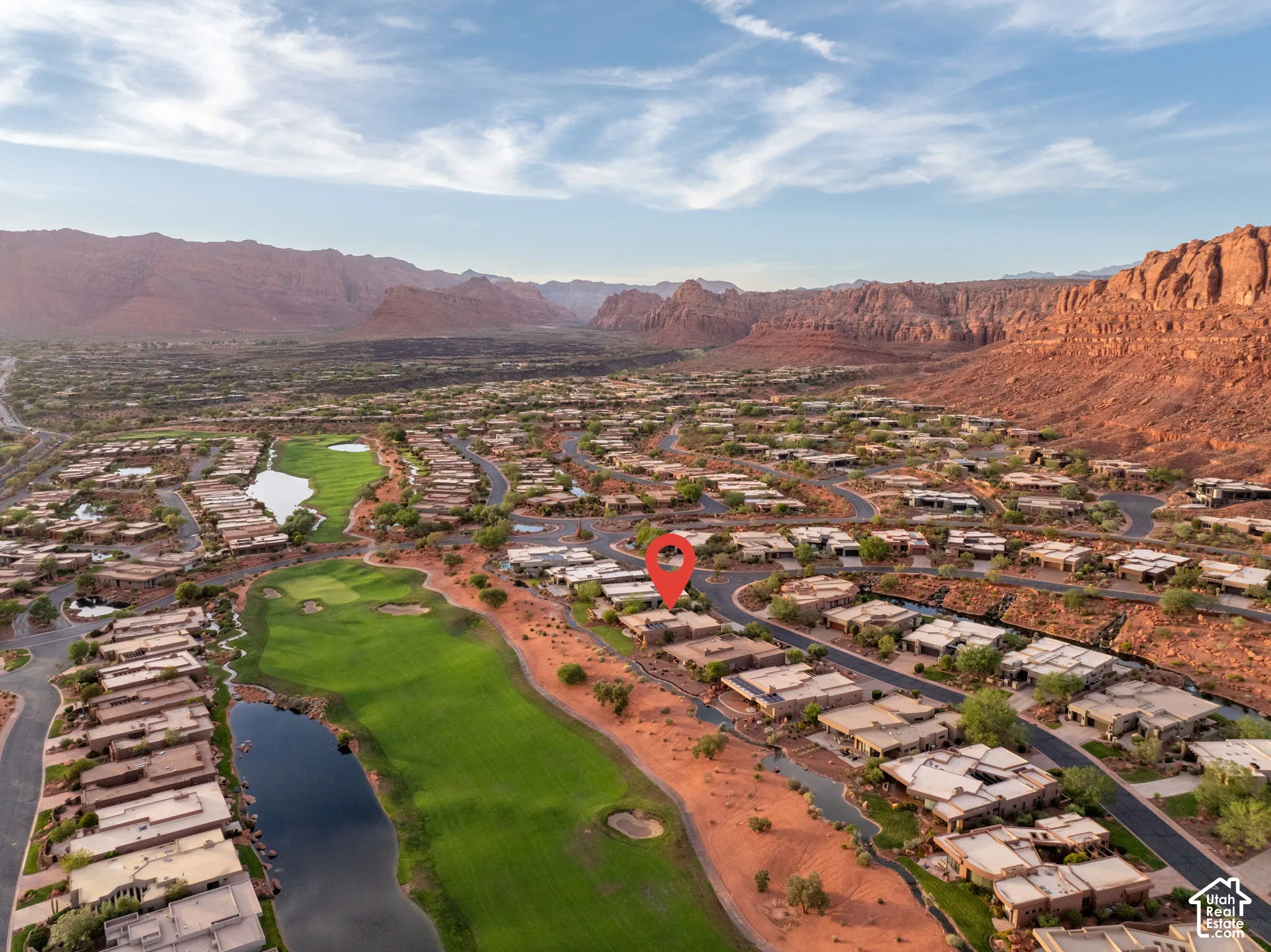 Aerial perspective showcasing a residential community nestled against natural rock formations