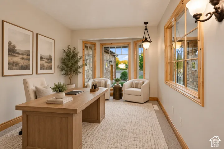 Bay window featuring natural wood trim, metal-framed interior window, and a hanging pendant light