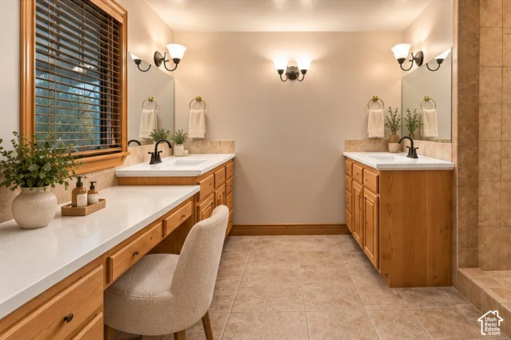 Dual vanity featuring wood cabinetry, white countertops, dual rectangular sinks with dark-finish fixtures, and wall-mounted lighting