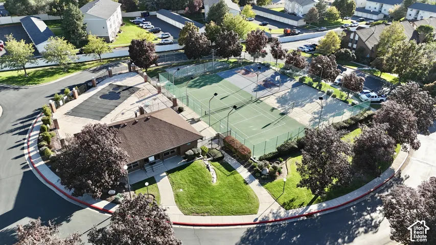 Community building with a shingle roof and covered swimming pool