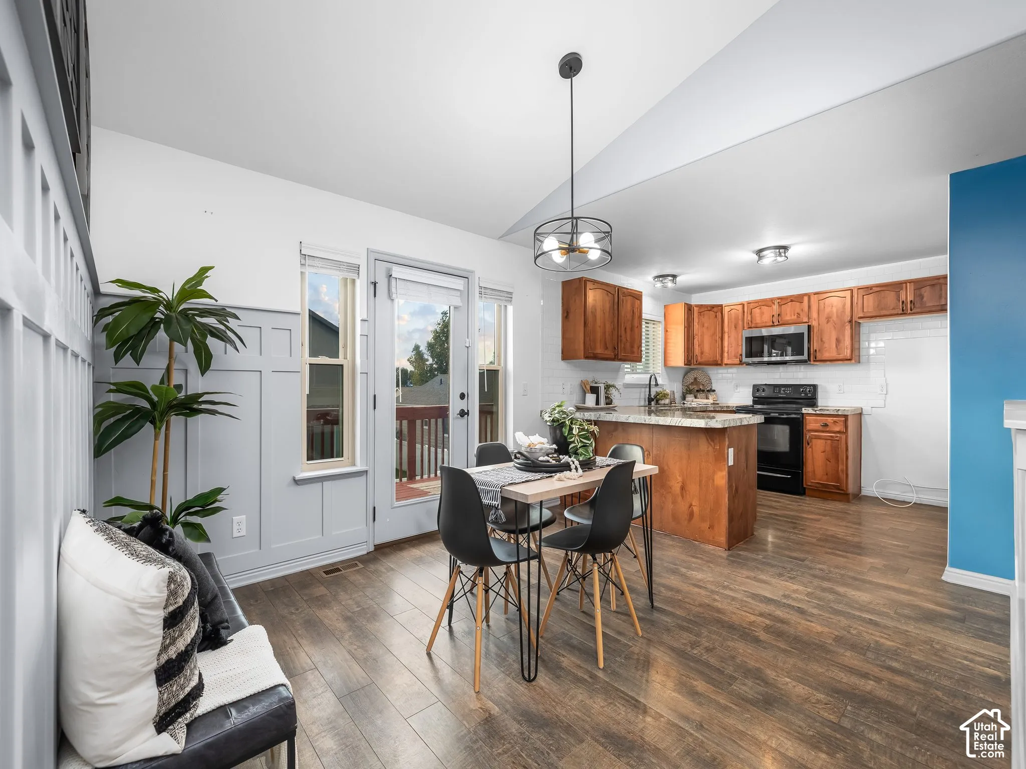 Wood-finish flooring throughout the open-concept space