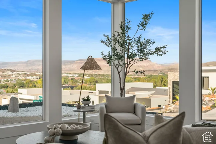Expansive corner windows showcasing distant natural scenery