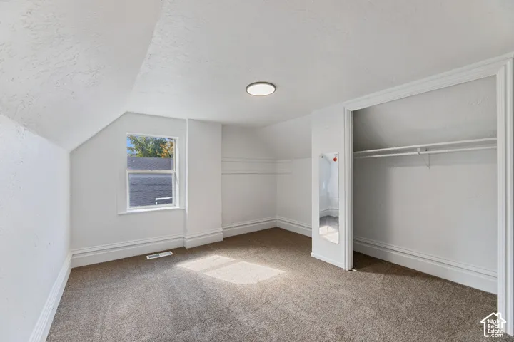 Main House Upstairs Bedroom 2 with New Carpet and Light