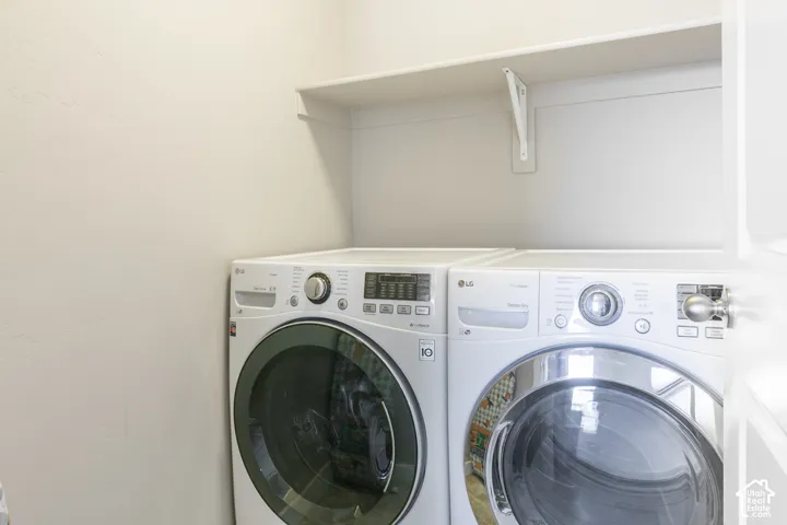 Laundry area with built-in shelving