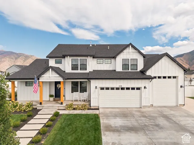 Modern farmhouse exterior with white board and batten siding