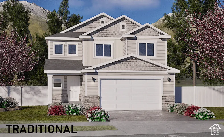 Two-story residence featuring light-toned siding, a two-car garage, and stone accents