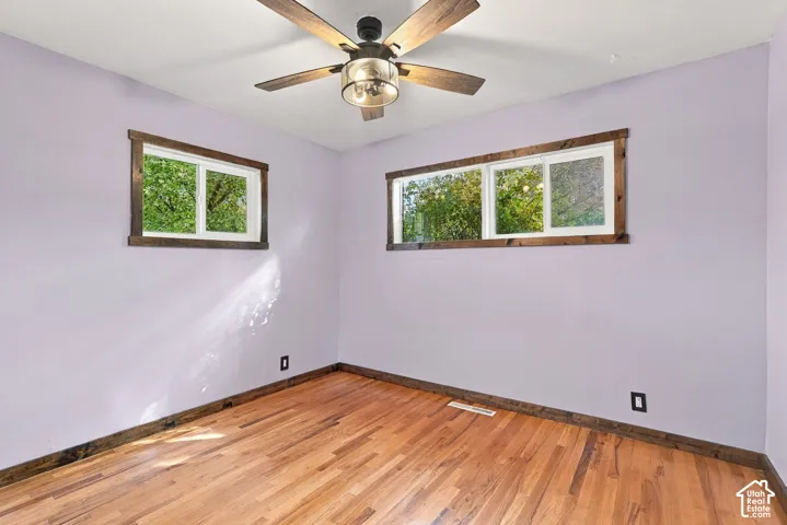 Hardwood flooring with wood-finish trim