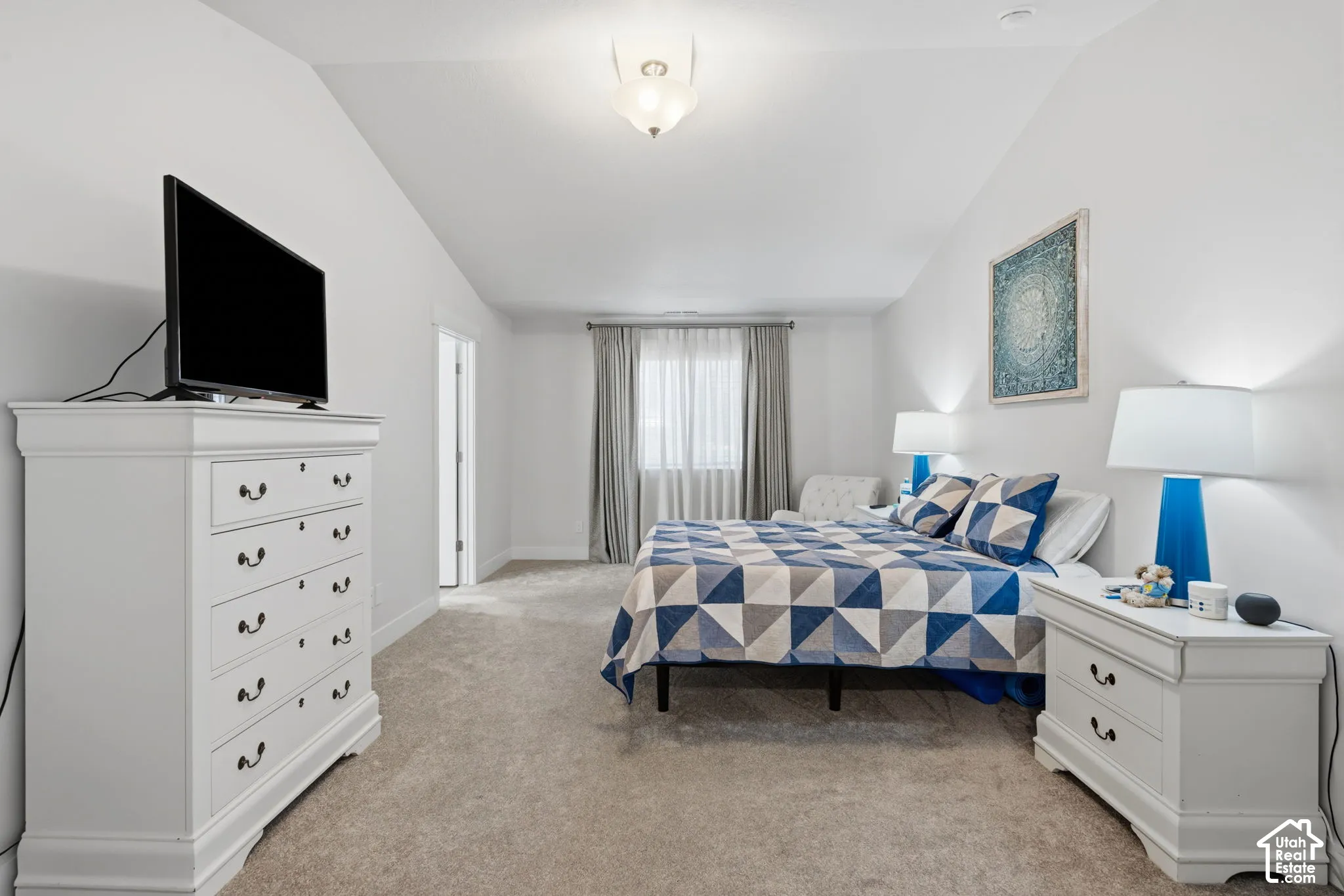 Master bedroom with Vaulted ceiling.