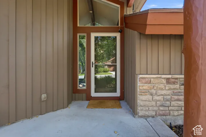 Board and batten siding with stone veneer accents