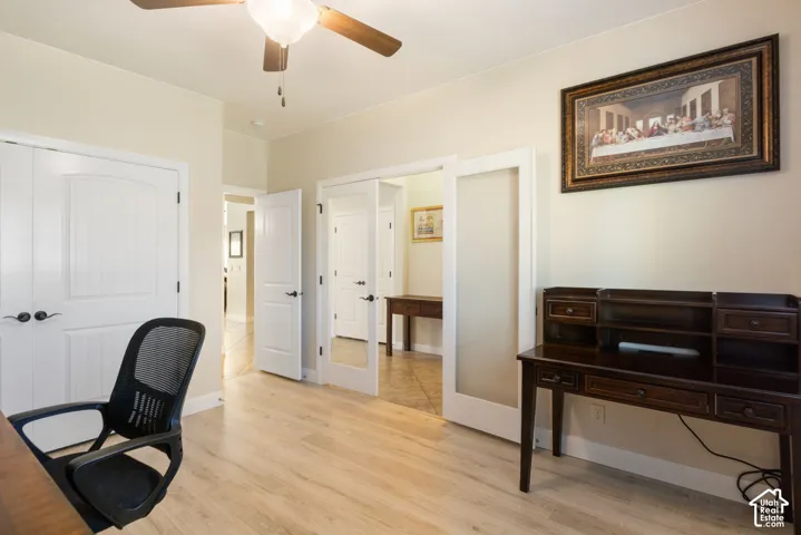 Light wood-finish flooring with neutral wall tones