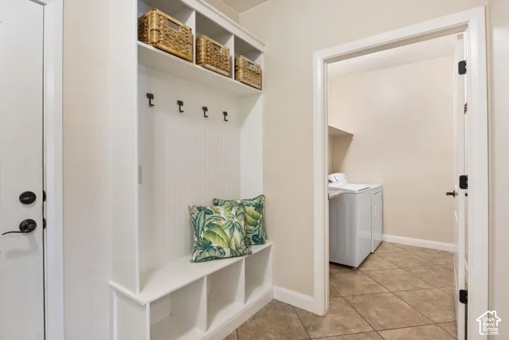 Built-in hall tree with storage compartments and wall hooks