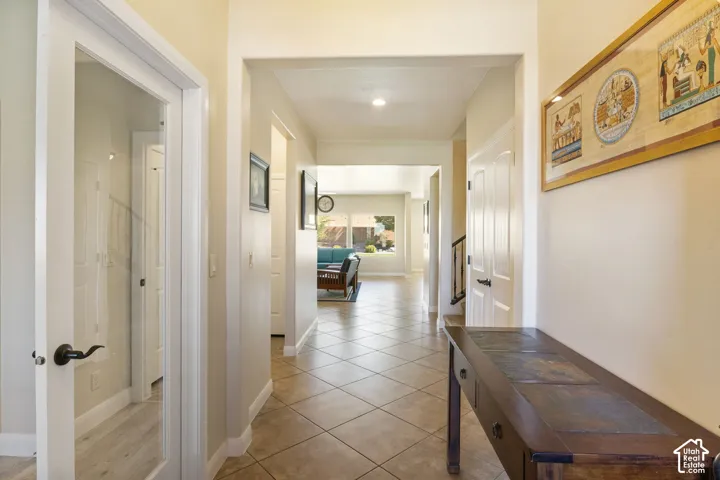 Tiled flooring throughout the hallway