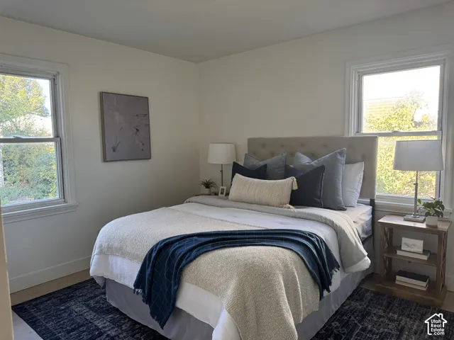 Neutral-toned walls with two double-hung windows