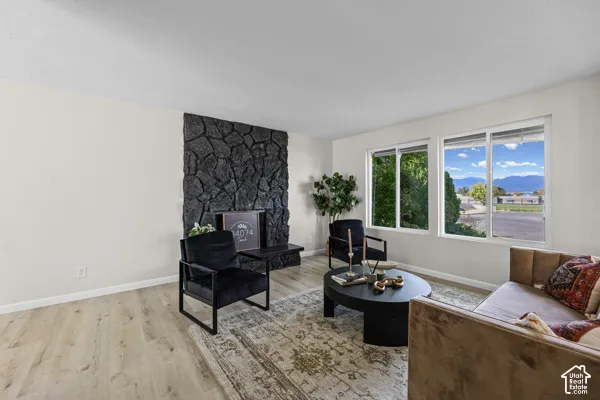Light wood-finish flooring with a textured ceiling