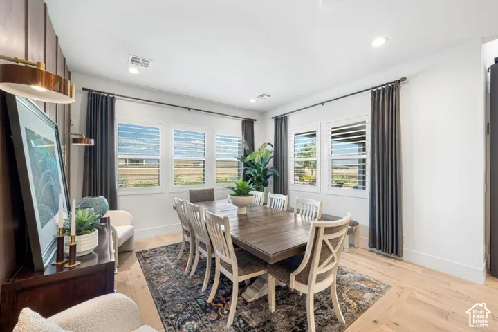 Wood-finish flooring with a textured area rug