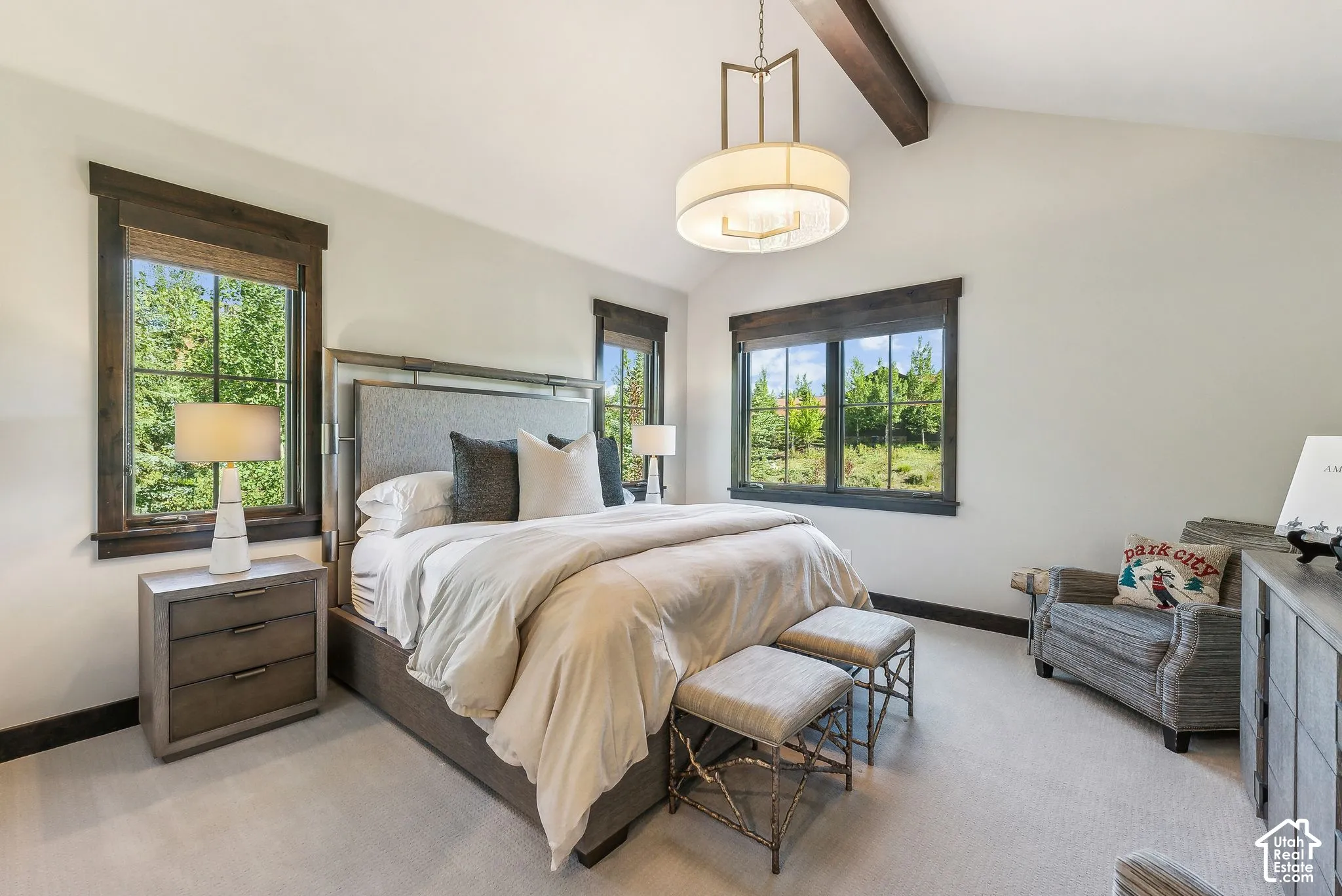 Vaulted ceiling with an exposed wood beam