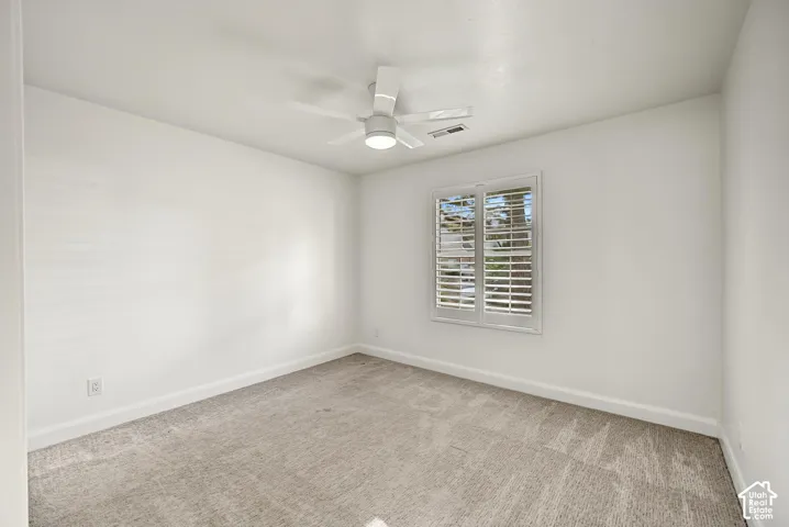 White walls with neutral carpeting