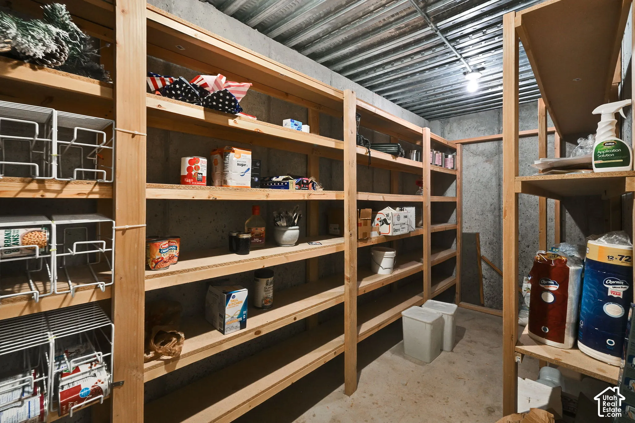 Extensive built-in wood shelving for storage