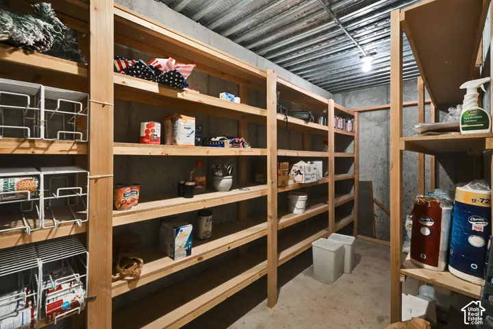 Extensive built-in wood shelving for storage