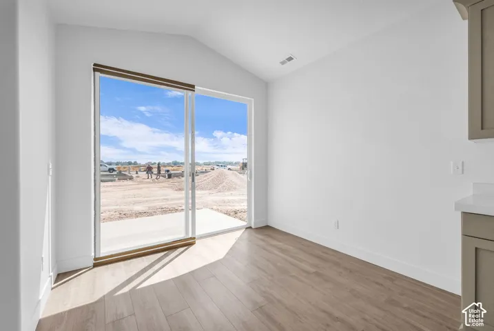 Dining area and large sliding glass door.
