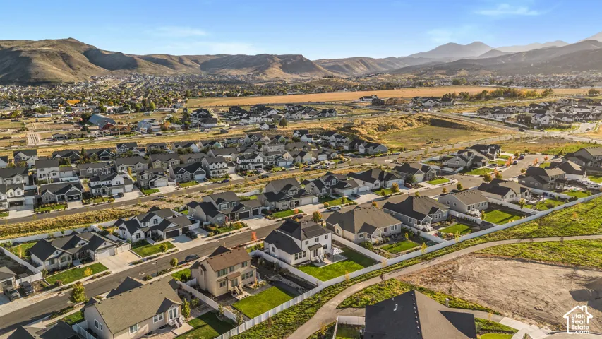 Residential development featuring single-family homes with mountain backdrops