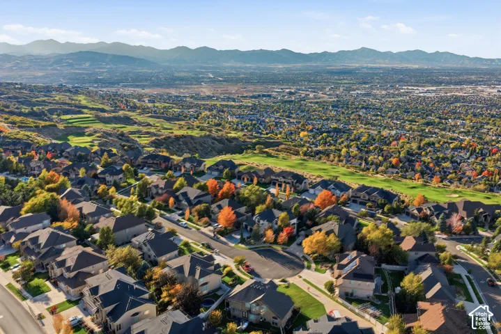 Aerial perspective featuring sweeping mountain horizons, expansive valley topography, and proximity to maintained greenbelts