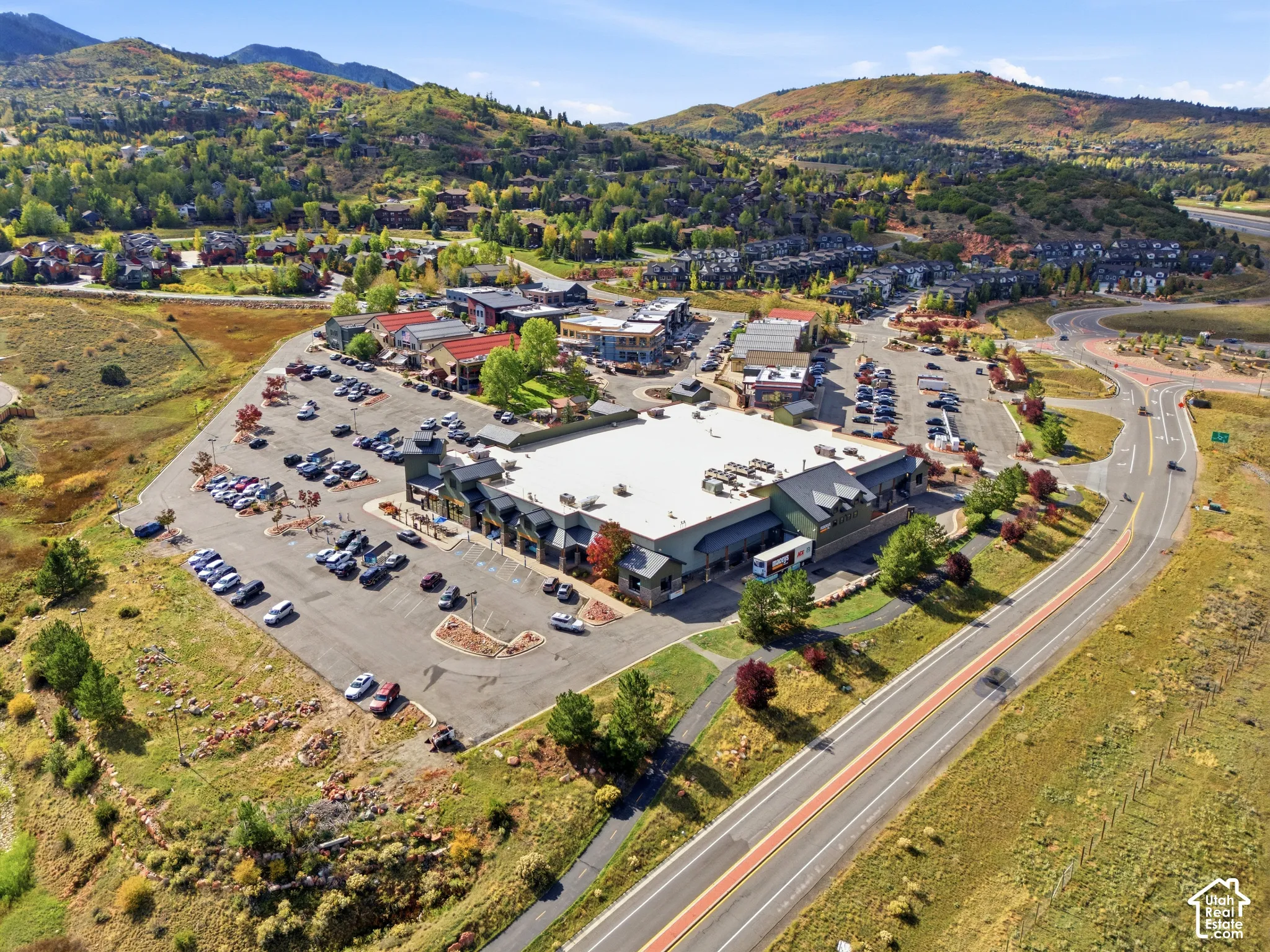 Aerial perspective showcasing commercial properties with parking facilities
