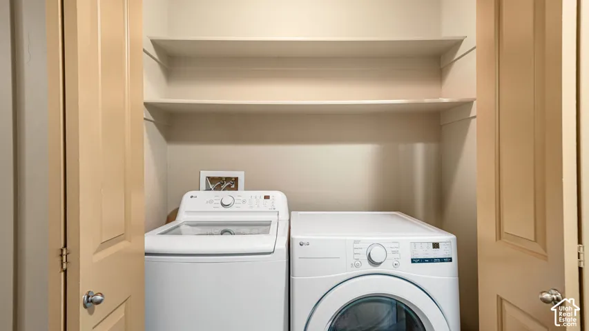 Laundry closet with built-in shelving