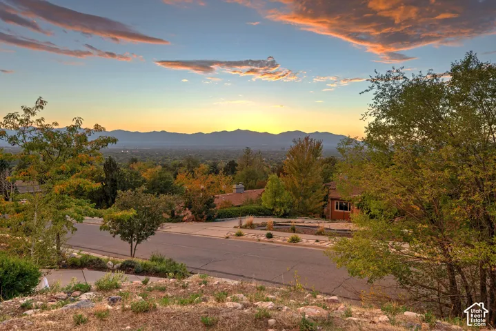 Mountain range backdrop with a distant cityscape
