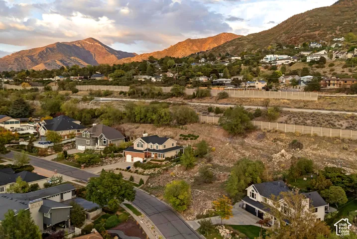 Terraced hillside setting with mountain backdrop