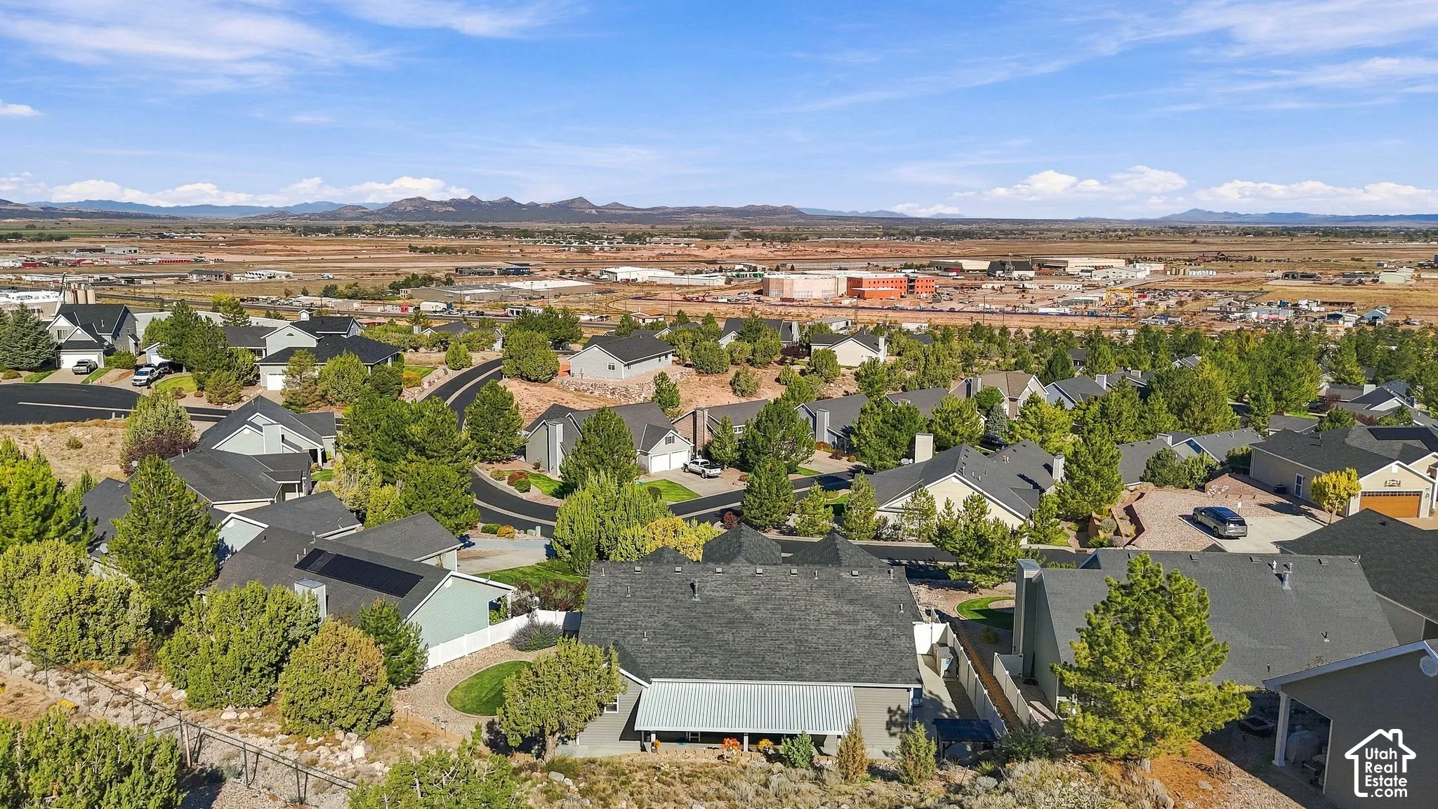 Residential neighborhood with varied rooflines and mature landscaping