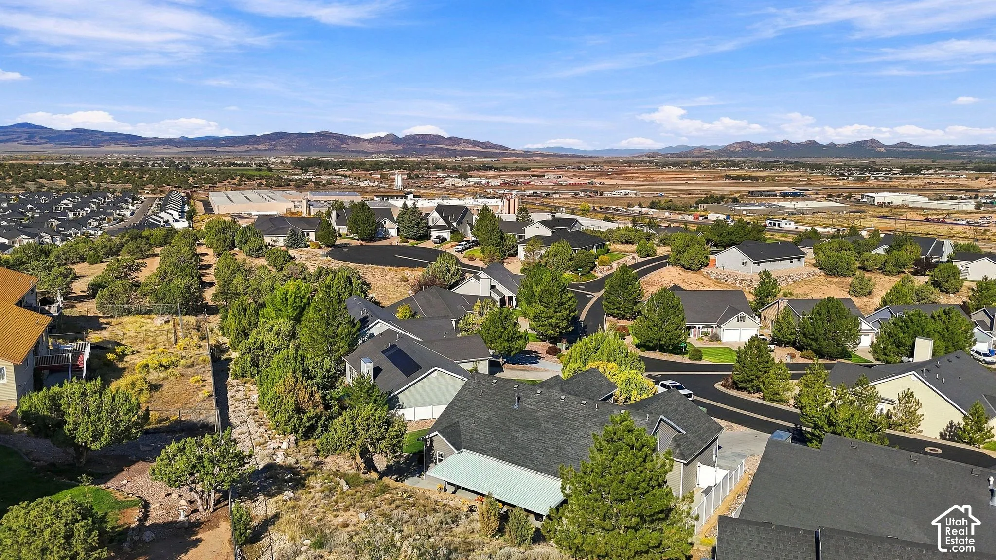 Residential neighborhood with varied rooflines and mature landscaping