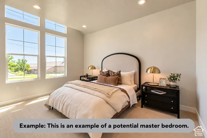 Recessed lighting, large windows, high ceilings, and neutral wall tones
