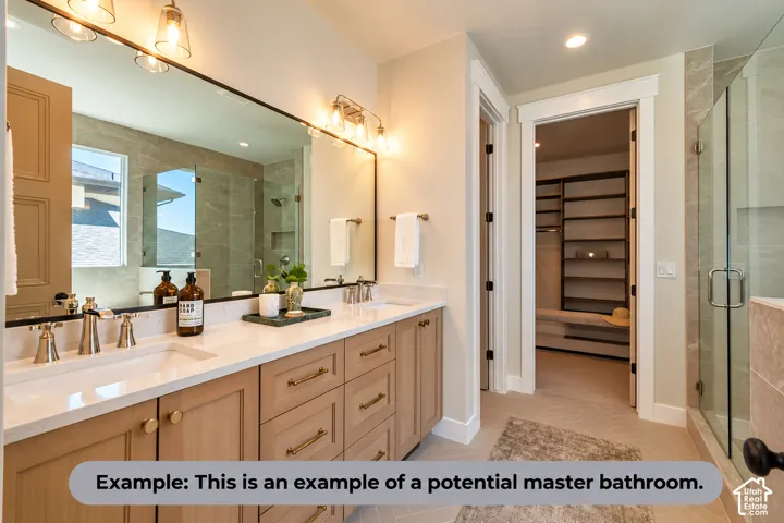 Dual vanity with light wood-finish cabinetry, white countertops, and brushed nickel fixtures