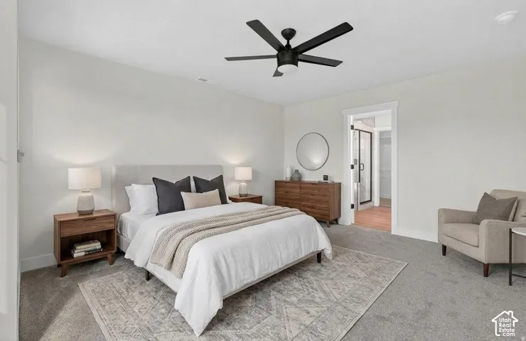 Recessed lighting, ceiling fan, and carpeted flooring