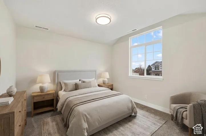 Single light fixture, large multi-pane window, light neutral wall paint, and white trim