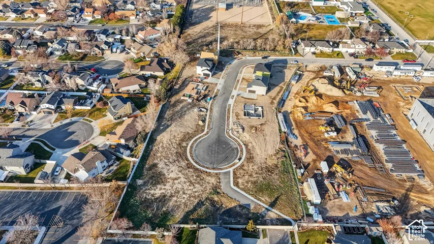 Cul-de-sac development with surrounding residential properties, existing infrastructure, and new construction