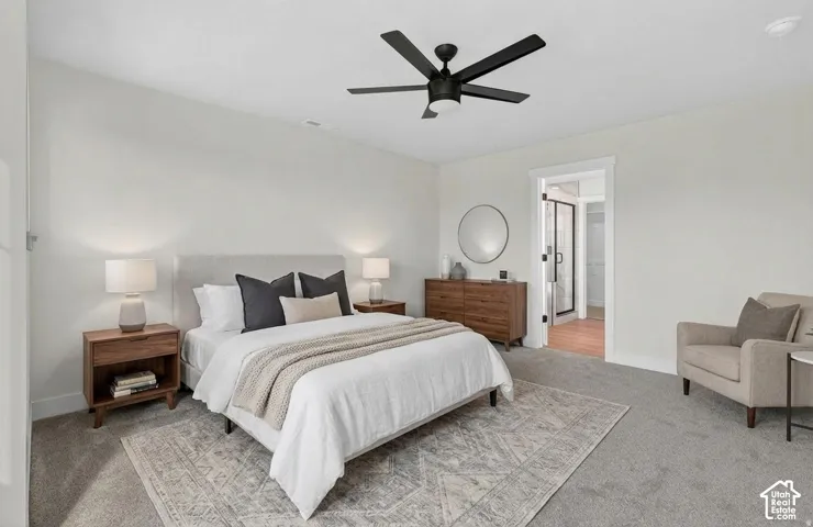 Recessed lighting, light gray carpet, and a black ceiling fan with an integrated light fixture