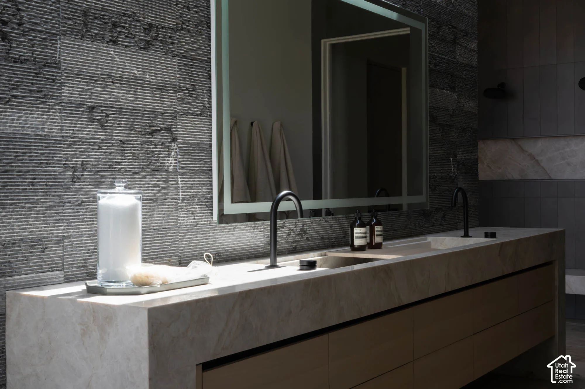 Dual integrated sinks with individual matte black faucets
