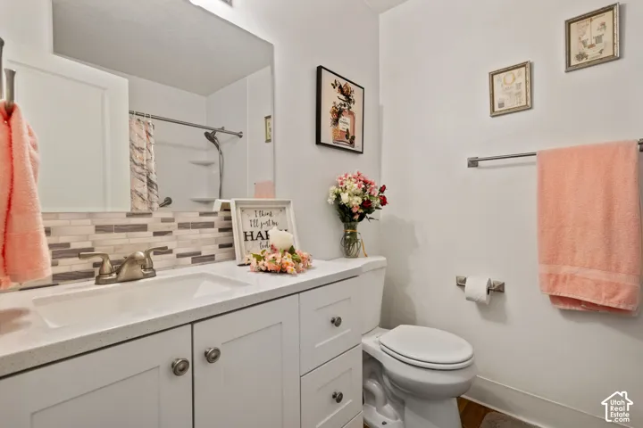 White vanity cabinetry with brushed nickel hardware