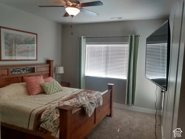 Comfortable Primary Suite with a walkout floor to the patio!