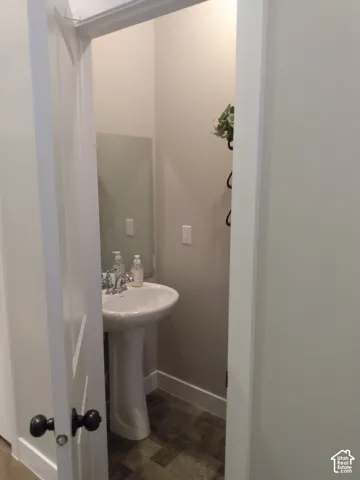 Half bathroom located by the front door for convenience!