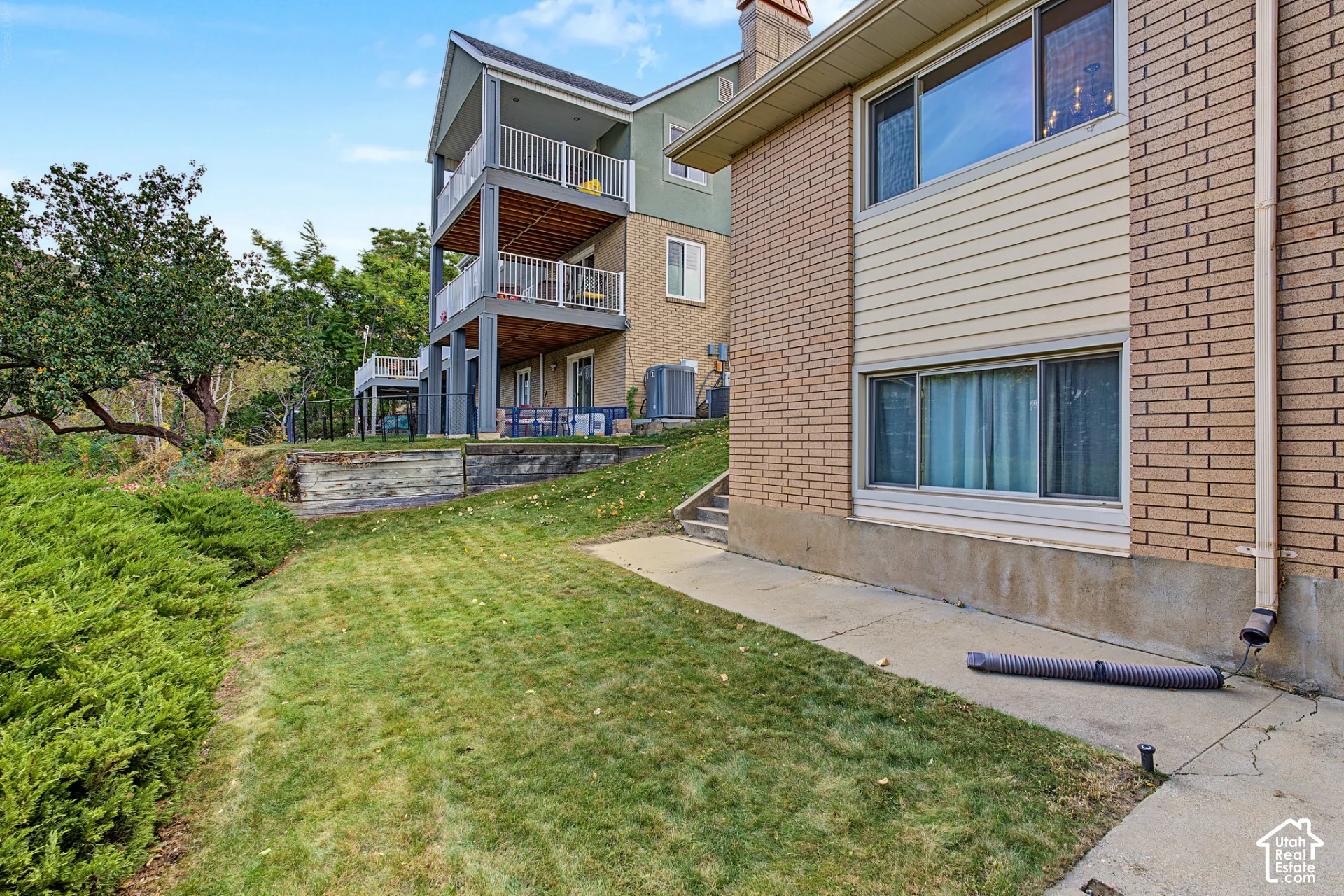 Brick exterior with horizontal siding accents