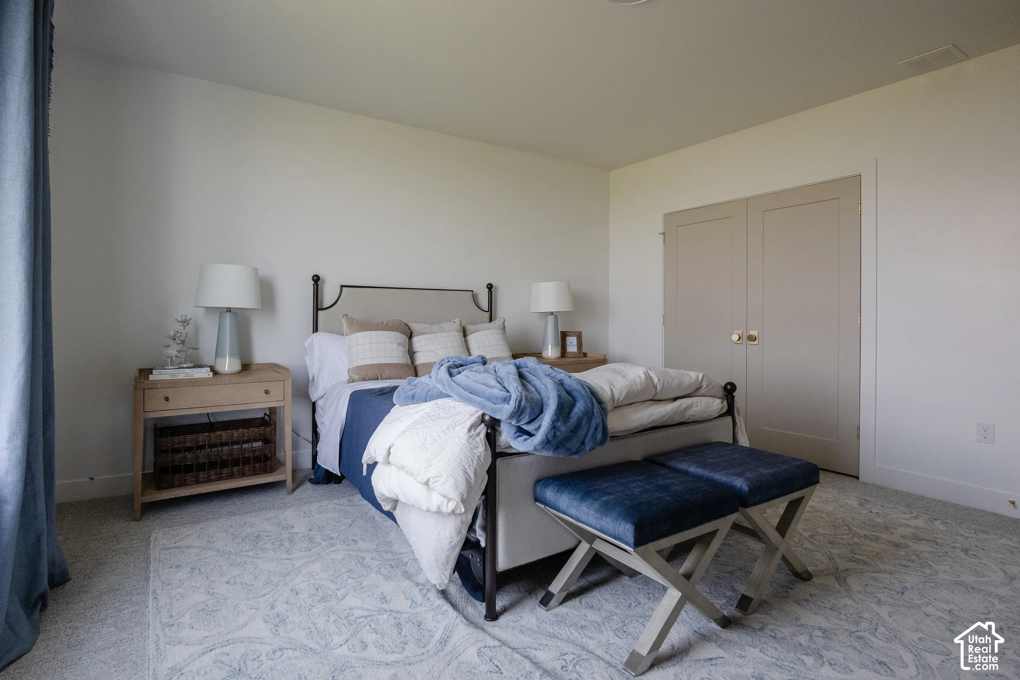 Recessed lighting illuminates neutral wall tones