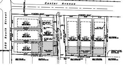 Plat Map. Illustrating the division of the property into multiple lots with corresponding dimensions and area specifications