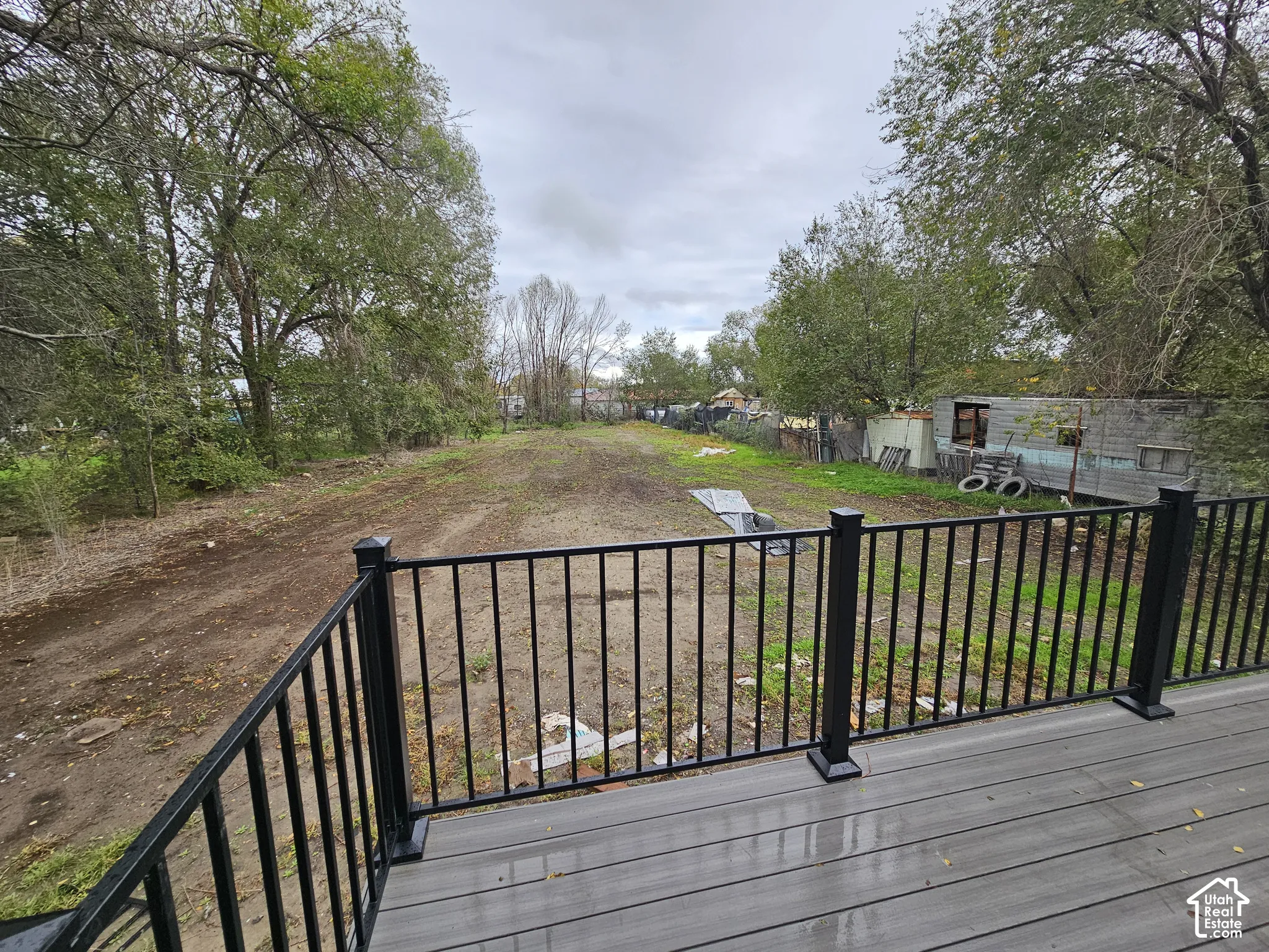 Expansive yard space with mature trees